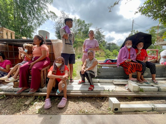 'Signs of Life' in Trash Pile Cause Search to Intensify