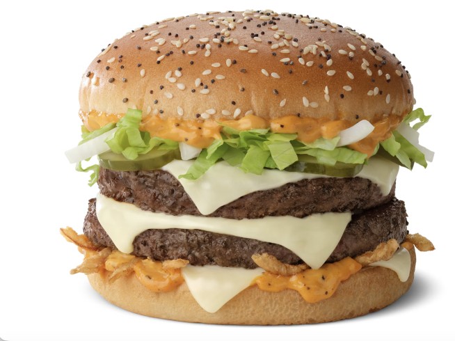 Op-Ed: McDonald's Embraces Gluttony With Its Big Arch