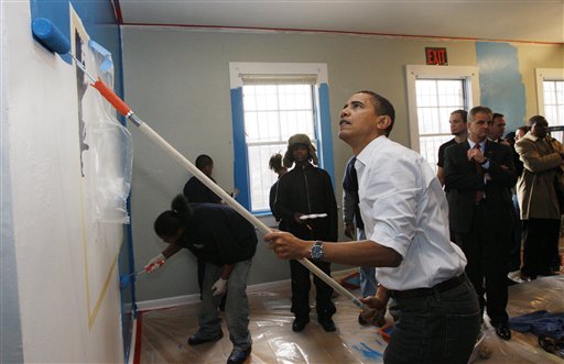 Obama Visits Troops, Pitches In at Homeless Shelter
