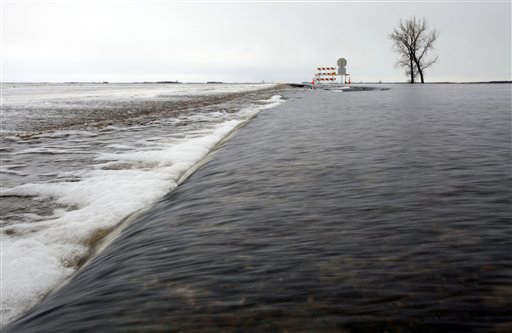 Blizzard Pounds Fargo, but Dikes Hold