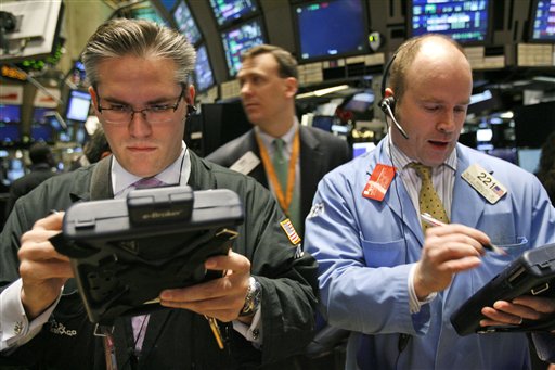 Stocks Slide Ahead of Earnings