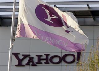 Yahoo to Cut 700 Jobs as Profit Plunges