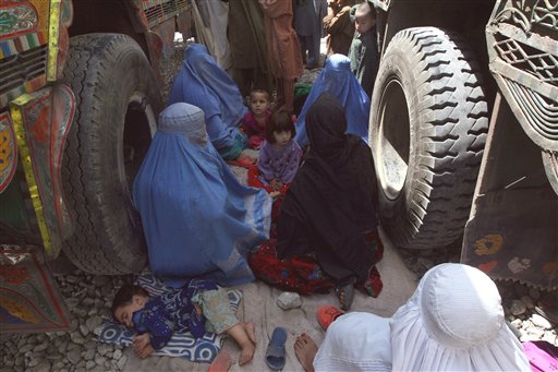 Afghan Refugees Flooding Home, Some Forced From Camps