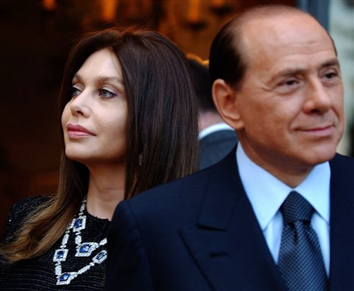 Berlusconi Blocks Release of Topless Photos