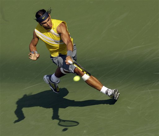 Injured Nadal Advances