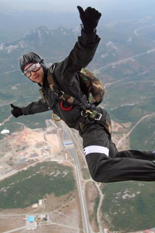 Skydiver Falls 2K Feet, Hits Steel Roof, Lives