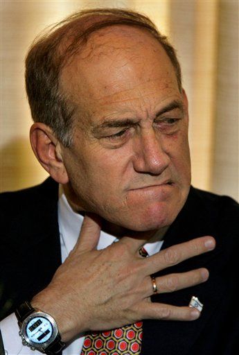 Olmert Charged With Corruption