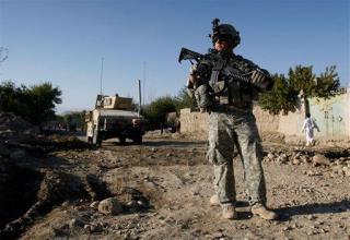 Iraq, Afghan War Reporter Said to Be a Spy