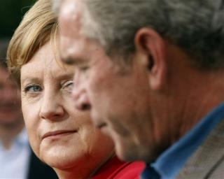 Bush, Merkel Meet in the Middle