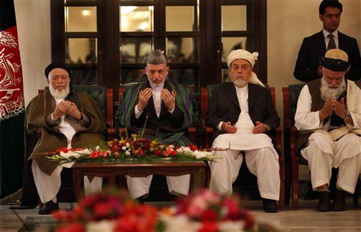 NATO Escorts Taliban Elite to Afghan Peace Talks
