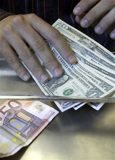 Dollar Gains Slightly Against the Euro