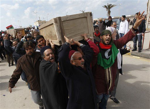 Libya's Moammar Gadhafi Offers Families $400