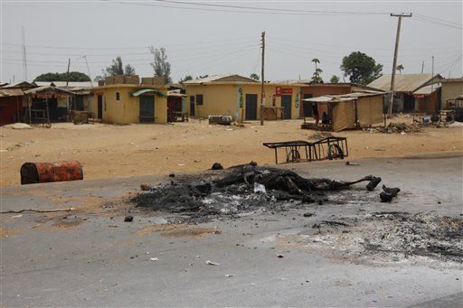Nigerian Riots Leave Charred Corpses, Houses, Cars