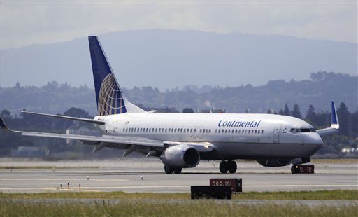 Flier Tried to Open Jet's Door in Suicide Attempt