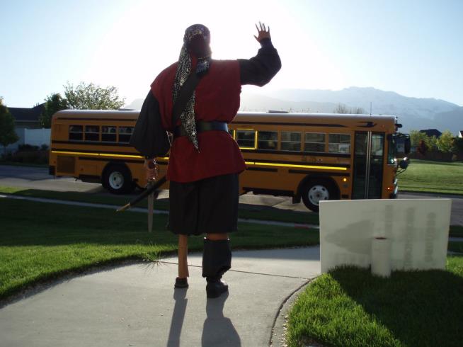 Embarrassing Dad Waves at Son's Bus in 170 Costumes