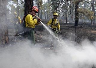 Arizona Wildfire Spreads to New Mexico, Prompts Warnings About Air Quality