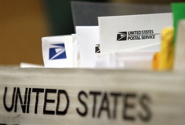 Obama Moves to Save USPS From Default