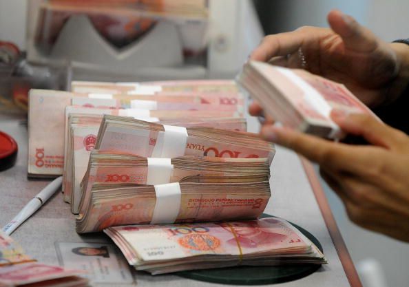 China Sets Yuan Rate at New High