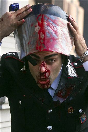 Occupy Wall Street Protests in Rome Turn Violent as Some Demonstrators Torch Cars, Clash With Police