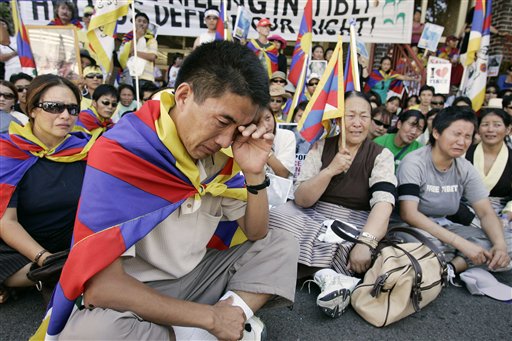 China Cracks Down; Dalai Lama Threatens to Resign