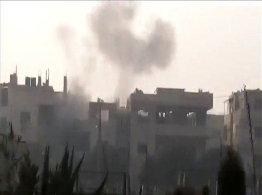 Syria Shells Homs, Kills 13