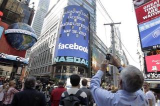 Facebook's First Trades: Shares Climb