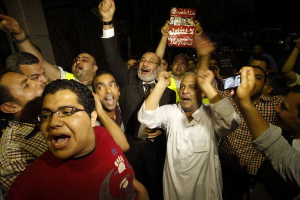 Egypt's Military Grabs Power as Islamist Declares Win
