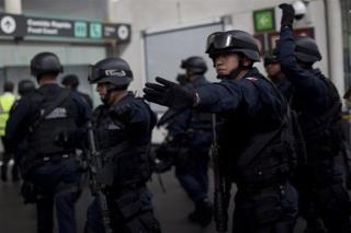 3 Cops Cut Down in Mexico City Airport