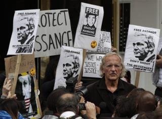 Assange: I Won't Turn Myself In