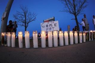Mourners Hold Vigil in Aurora for Victims