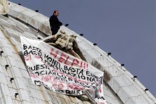 Italian Protester Scales St. Peter's Dome