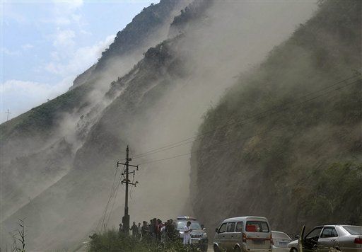 China Landslide Buries 18 in School