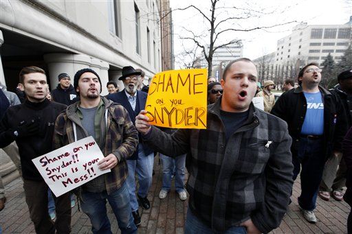 Michigan Protestors Fight With Christmas Carols