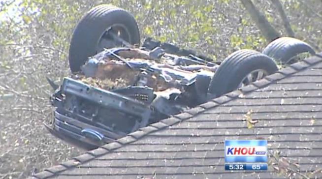 SUV Hurtles Through House, Lands in Roof Next-Door