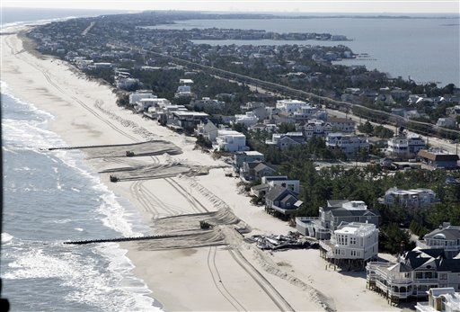 Rich Defend Beach Homes ... but Put Beach at Risk