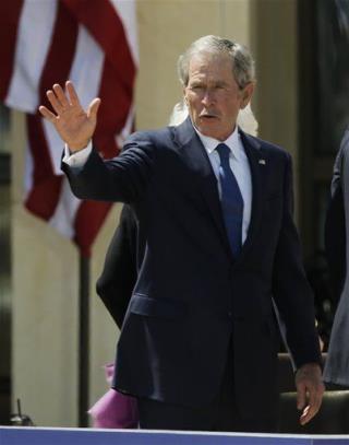 Two Views on Bush: Savior vs. Dimwit