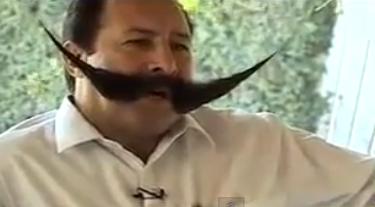 Businessman Seeks Asylum Over Moustache