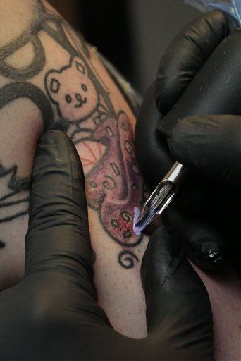 DC Proposes 24-Hour Waiting Period for ... Tattoos