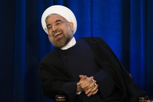 Protester Lobs Shoe at Iran's Rouhani