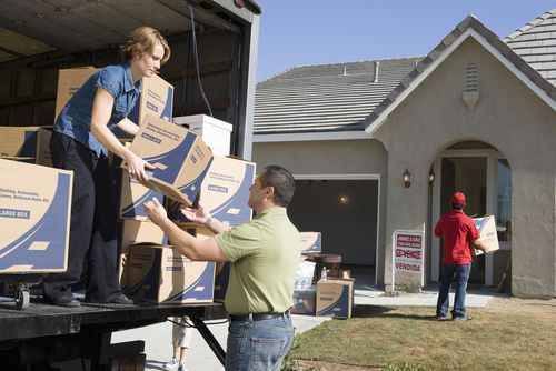 As Economy Improves, More Americans Pack Up and Move
