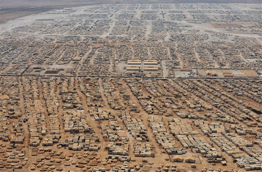 Syrian Rebels Recruit New Fighters at Refugee Camp