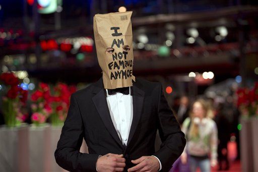 Shia LaBeouf Wears 'I Am Not Famous' Bag on His Head