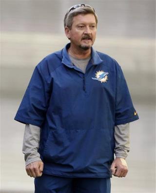 Dolphins Fire Coach Accused in Sex Doll Incident