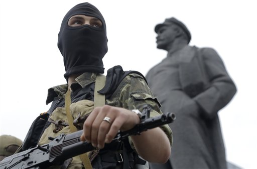 Putin Backs Ukraine Cease-Fire—And Orders Troop Drills