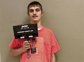 Guy's Jail Attire: T-Shirt With His Own Mugshot