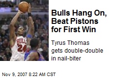 Bulls Hang On, Beat Pistons for First Win