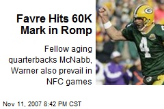 Favre Hits 60K Mark in Romp