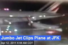Jumbo Jet Clips Plane at JFK