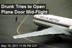 Drunk Tries to Open Plane Door Mid-Flight