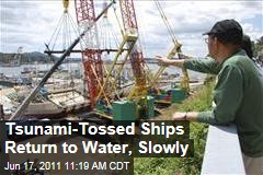 Japan Tsunami Clean-Up: Massive Fishing Ships Returned to Water